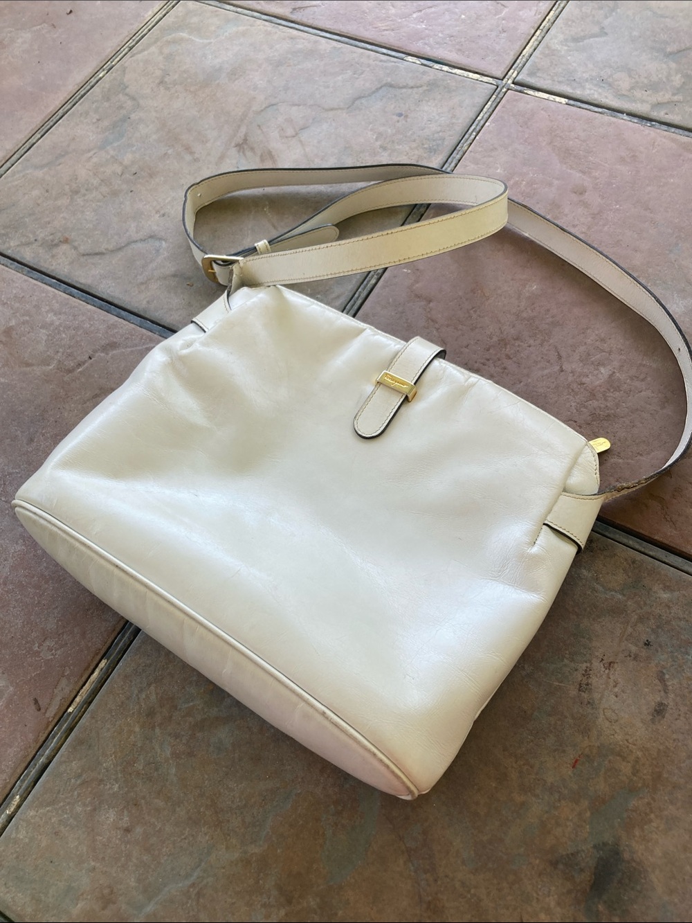 Distressed Salvatore Ferragamo Cream Leather Crossbody with Gold Hardware